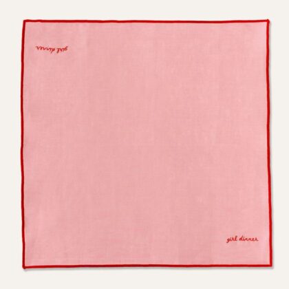 ผ้าสีชมพูอ่อนลายเรียบ พร้อมคำว่า "café blossom"